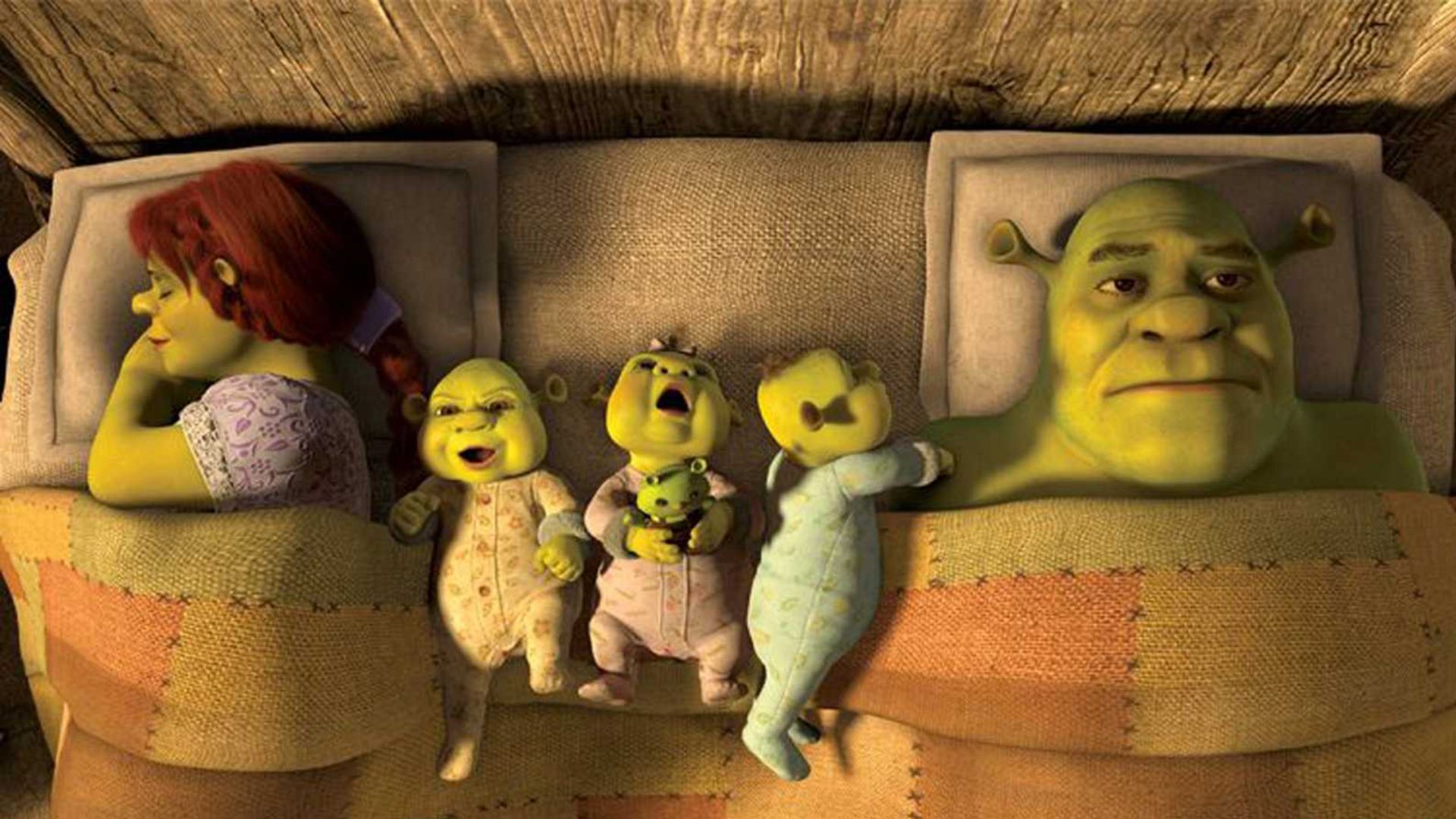 Shrek Fiona y sus tres bebes en still de la pelicula