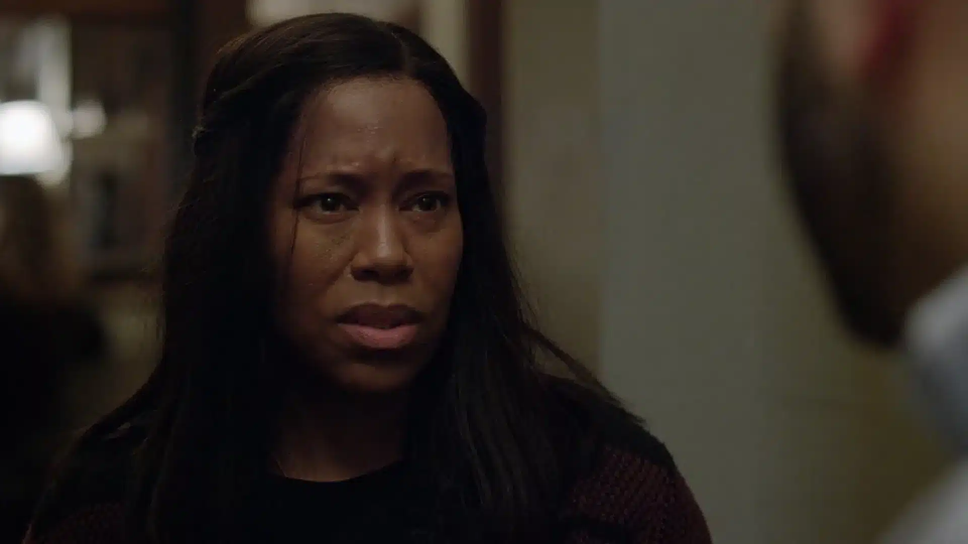 Regina King, triste.