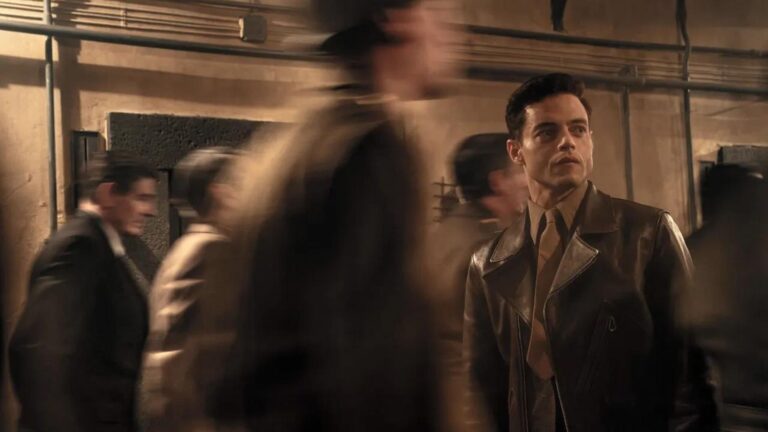 el amateur rami malek persecución