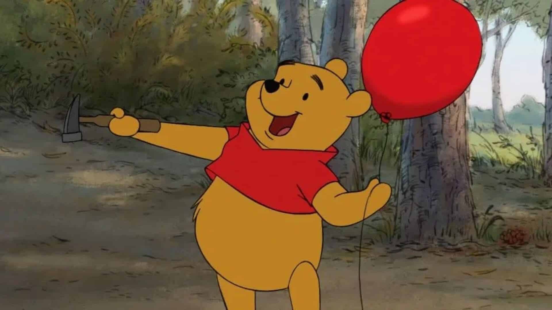 winnie pooh con globo rojo