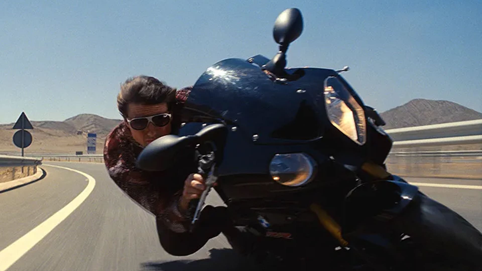 Tom Cruise escena motocicleta