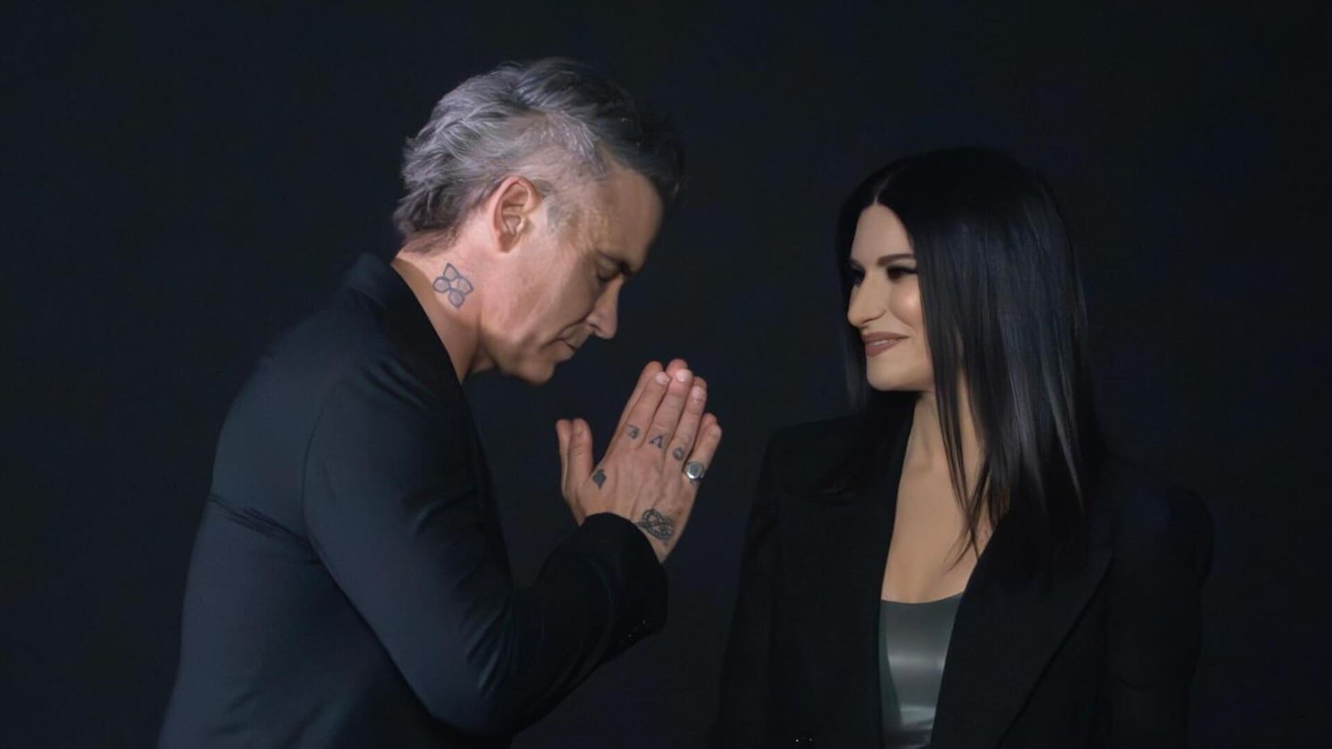 laura pausini y robbie williams